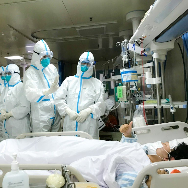 Doctors with patient