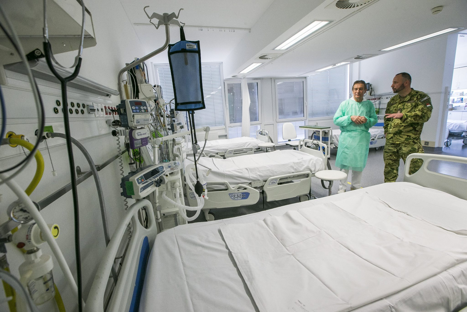 Two doctors discussing in empty hospital